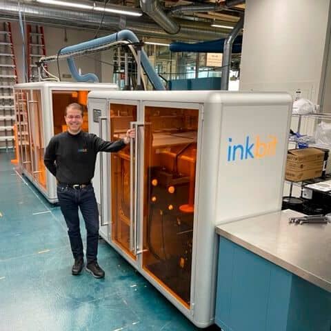 Inkbit SVP-Commercial Eric Bert reviewing the Saint-Gobain installation.
(Source: Inkbit )