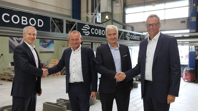 From left to right: Simon Wiedemann, Head of Solutions and Products, Holcim; Henrik Lund-Nielsen, Founder and General Manager in COBOD; Edelio Bermejo, Group Head of R&D and IP; Lars Bugge, Chairman in COBOD International. Source: COBOD