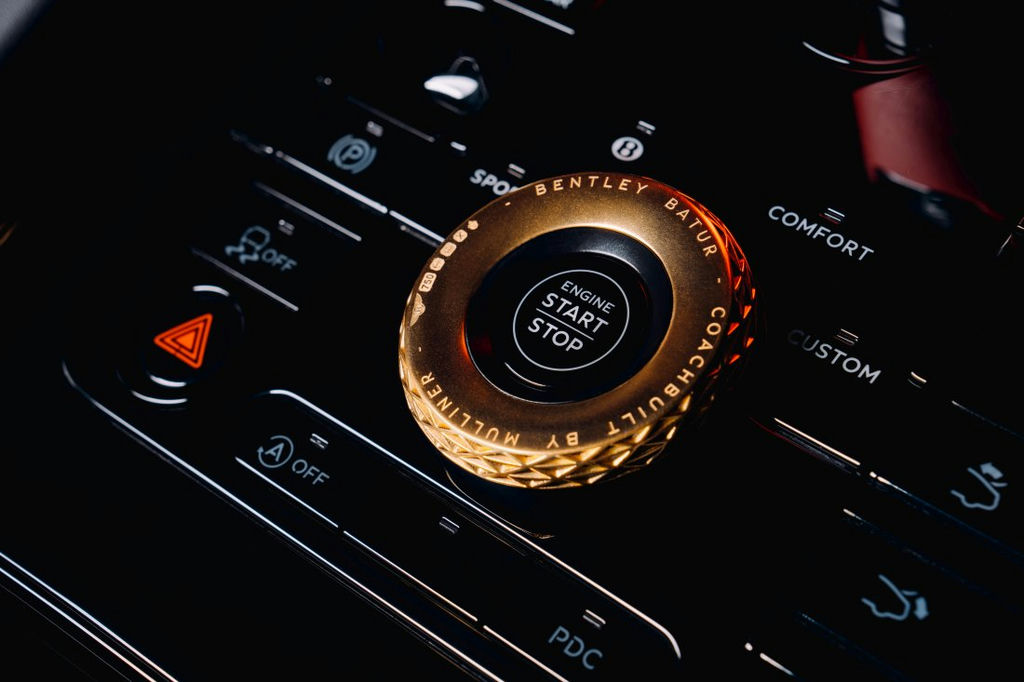 The optional, 3D printed gold includes key driver touch points, such as the start/stop button. Image courtesy of Bentley Motors