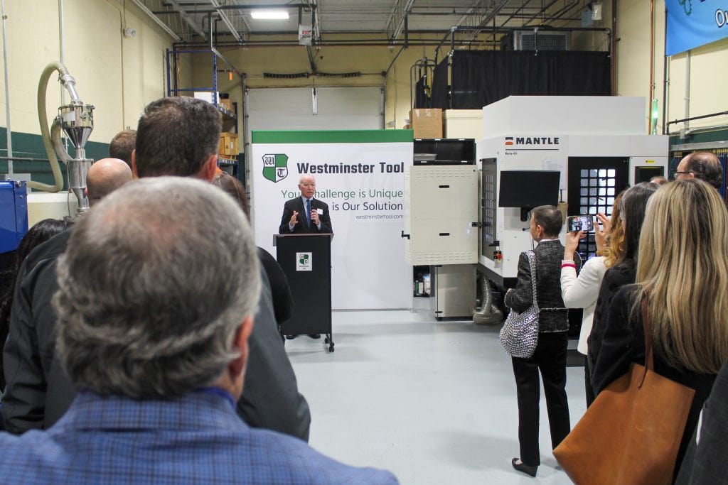 State officials and industry leaders gathered at Westminster Tool on Thursday to witness the latest metal 3D printing machine in action.