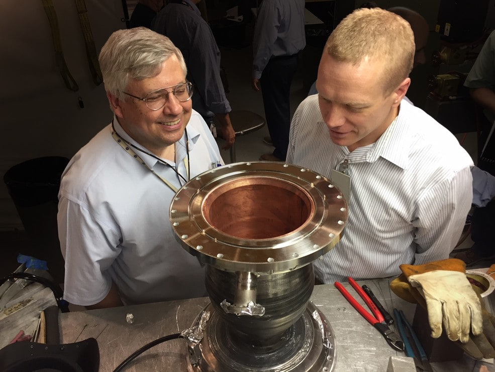 NASA materials engineers Dave Ellis and Chris Protz inspect the first additive manufactured GRCop combustion chamber.
Credits: NASA